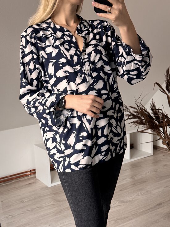 Melnbalts tops 46,48